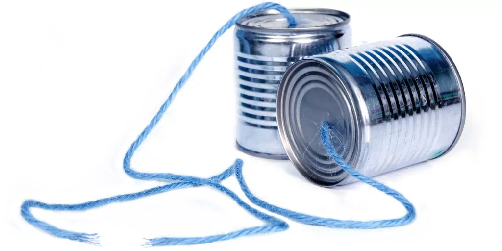 Tin can telephones connected by blue string